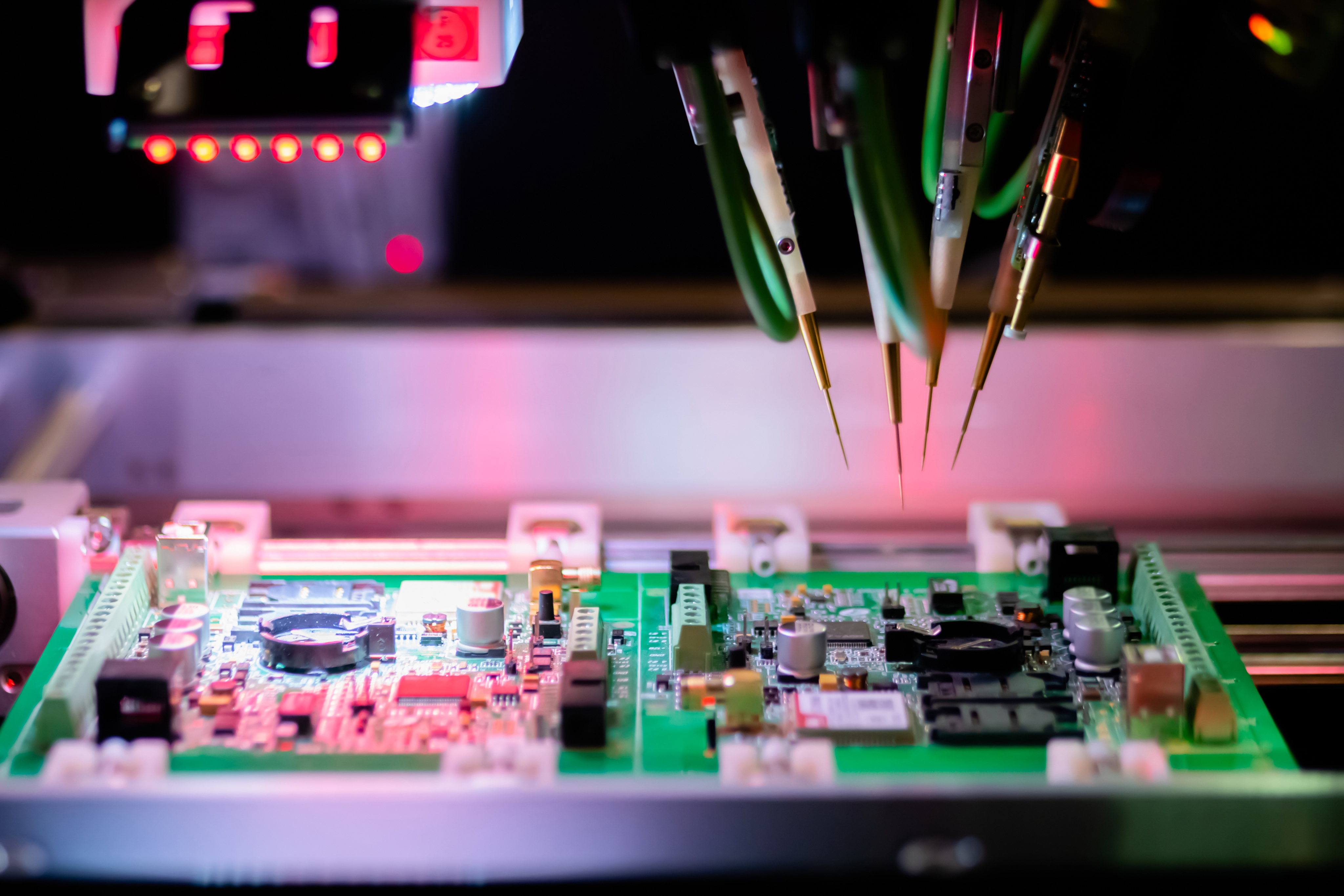 Person sitting on floor working on laptop